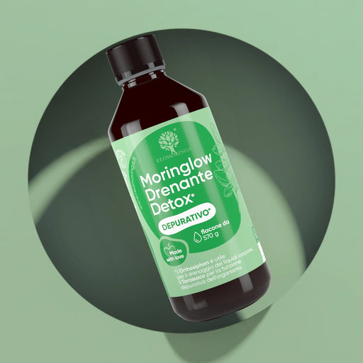 Moringlow Drainant Detox RedMoringa, drainant liquide au Moringa, flacon de 570 g sur fond vert