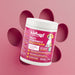 Barattolo da 250g di integratore in polvere Wellwoof Multi Vitaminico su sfondo rosa con l'icona di un'impronta di zampa. Il packaging sottolinea la formula con 20 oligoelementi e l'assenza di derivati animali.