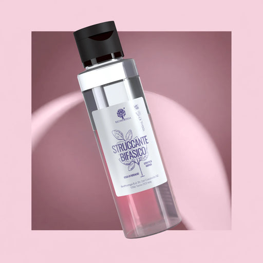 Démaquillant biphase naturel RedMoringa au Moringa et à l'eau de bleuet, flacon de 100 ml sur fond rose